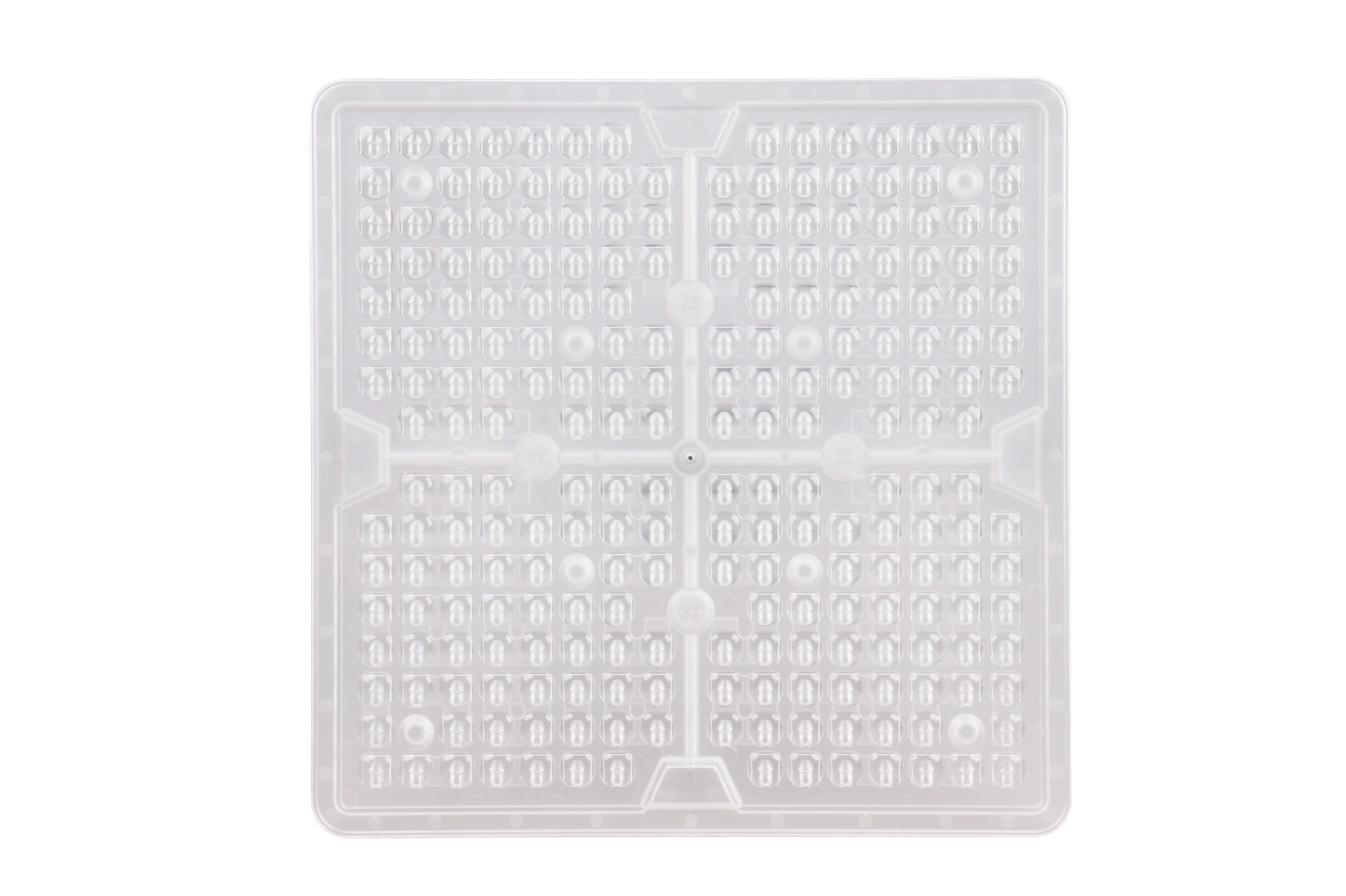 Top-down view of the Liberty pro-optics polycarbonate lens panel showing the precision micro-prismatic refractor cells that shape the IES Type-III distribution. This module is the field-swappable component.