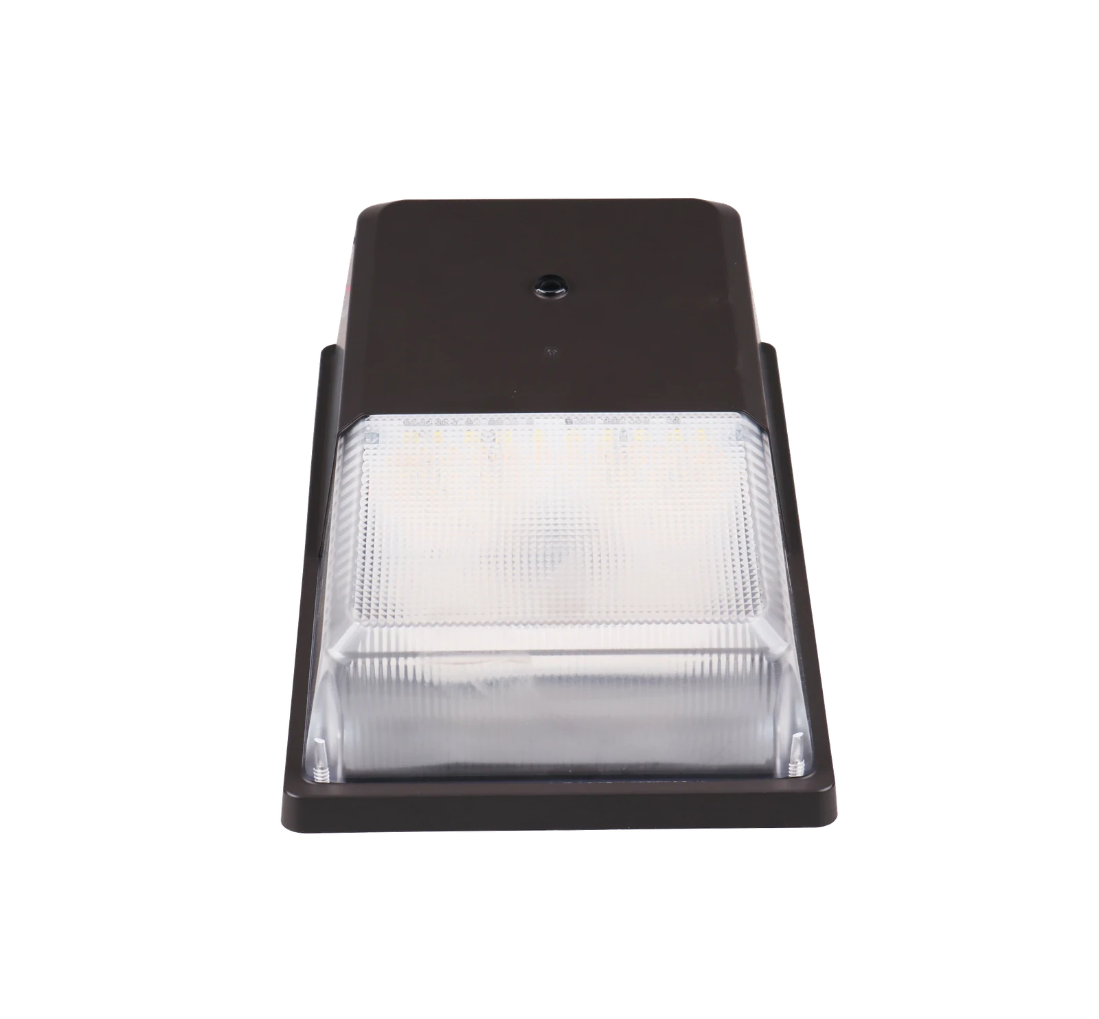 Ramparts integrated photocell port at top of die-cast housing — dusk-to-dawn automatic operation, no separate controls package, no commissioning