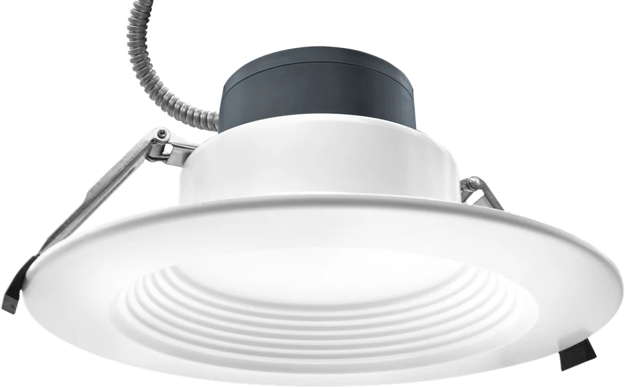 LCDL Solstice — can-less commercial downlight · ambient fill alongside architectural-linear pendants